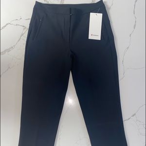 “Lululemon On the Move Pant”. I have two pairs: size 6NWT and size 4!